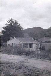 A person standing in front of a house

AI-generated content may be incorrect.