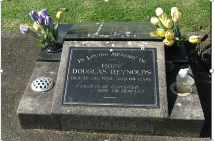A picture containing text, grass, outdoor, plaque

Description automatically generated